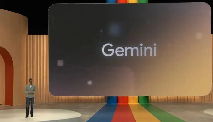 The image shows Google CEO Sundar Pichai introducing Gemini AI, supposedly the future rival to ChatGPT. — Google