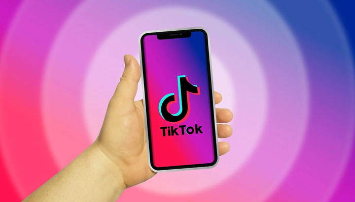 An undated image of TikTok logo displayed on a phone screen. — Freepik