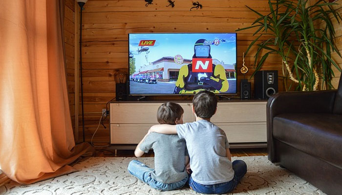 An undated image of children watching TV. — Pixabay