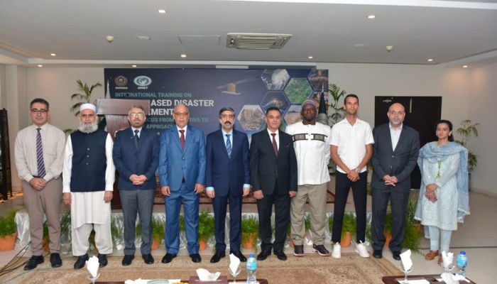 An undated image of SUPARCO and ISNET participants group picture. — Supplied
