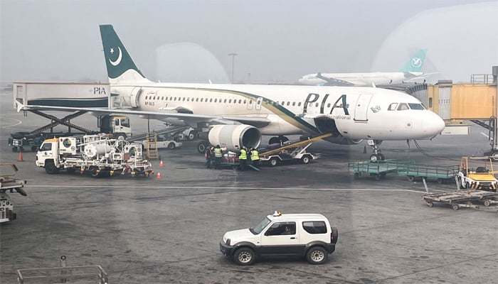 A PIA plane at Allama Iqbal International Airport in Lahore, Pakistan January 29, 2024. — Reuters