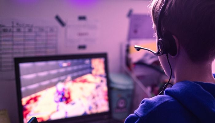 An undated image of a boy playing game. — Canva