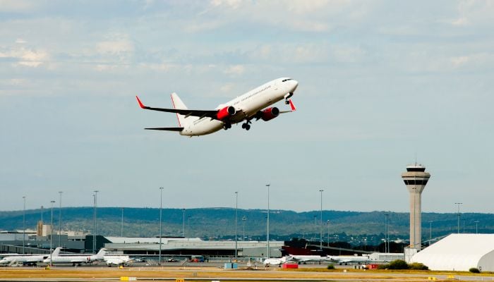 An undated image of a plane taking off. — Canva