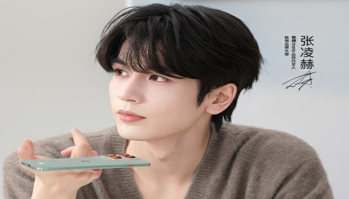 An undated image of a person holding Moto X70 Air. — Lenovo