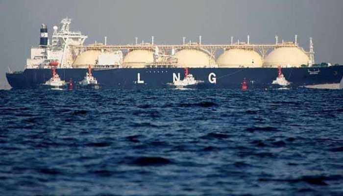 An image of a liquefied natural gas (LNG) tanker tugging towards a thermal power station in Futtsu, east of Tokyo, Japan, on November 13, 2017. — Reuters