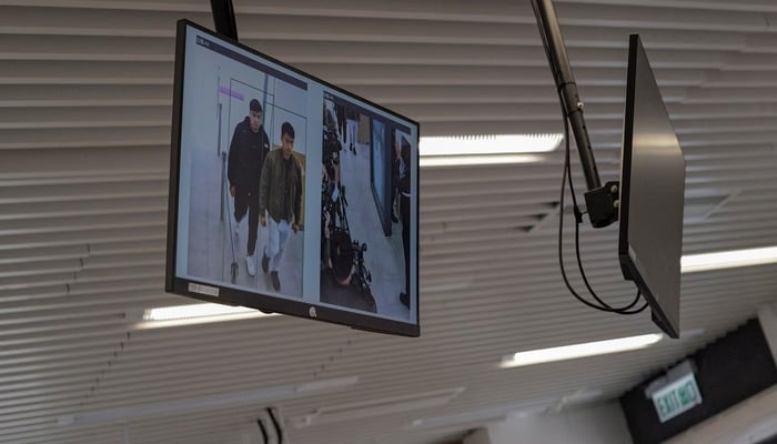 A screen shows scans of people through a new contactless channel, utilizing facial recognition technology to allow individuals to pass without stopping to show their documents, at the Chung Ying Street checkpoint, a border street where one side belongs to Hong Kong and the other to Chinese Shenzhen, during a media tour in Hong Kong, China December 23, 2024. — Reuters