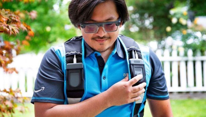 An undated image of a person wearing Amazon’s AI-driven smart glasses. — About Amazon