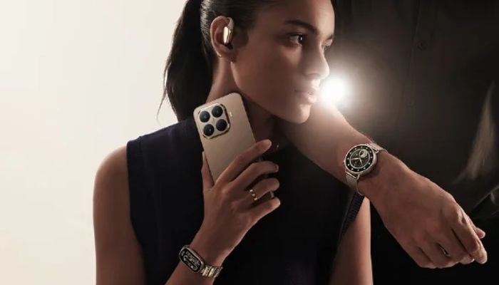 An undated image of a person holding Xiaomi 15T Pro. — Xiaomi