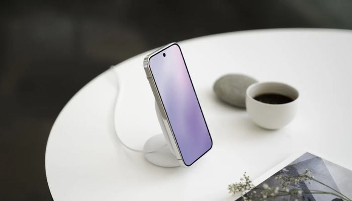 An undated image of Google Pixel 9 Pro XL charging on Pixelsnap Charger. — Google Blogs