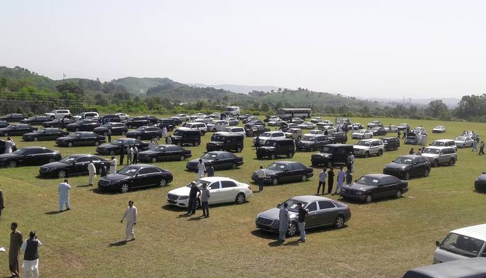 People visit an auction of government owned used cars at the premises of Prime Minister House in Islamabad, Pakistan September 17, 2018. — Reuters
