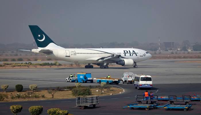 A Pakistan International Airlines (PIA) plane prepares to take-off at Alama Iqbal International Airport in Lahore February 1, 2012. — Reuters