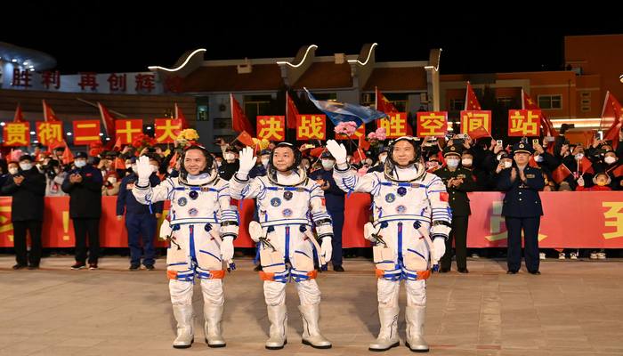 Astronauts Fei Junlong, Deng Qingming and Zhang Lu attend a see-off ceremony before the Shenzhou-15 spaceflight mission to build Chinas space station, at Jiuquan Satellite Launch Center, near Jiuquan, Gansu province, China September 29, 2022. — Reuters