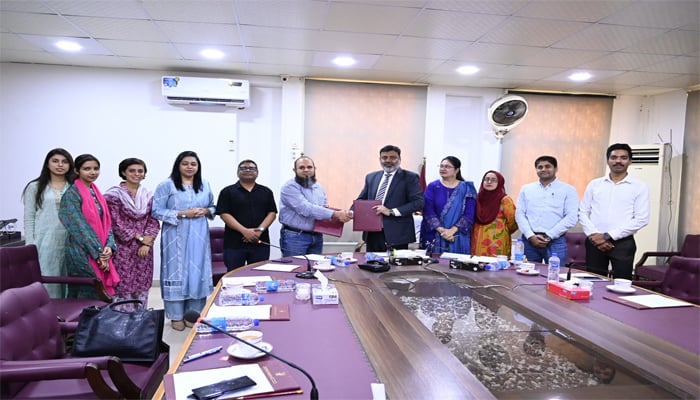 An image shows University of Karachi and IO Digital Private Limited partnering for online scholarship portal, on October 30, 2025. — Facebook/@uoktimes