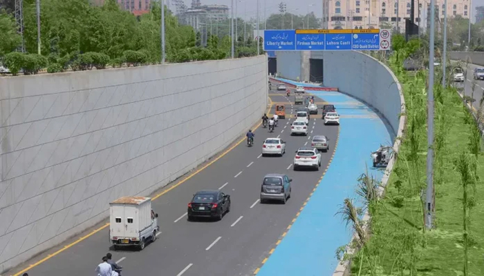 An undated image show vehicles on Lahore road. — APP