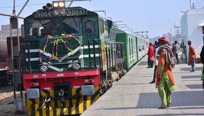 An undated image of Green Line Express train attached with new imported coaches from China at a railway station. — APP