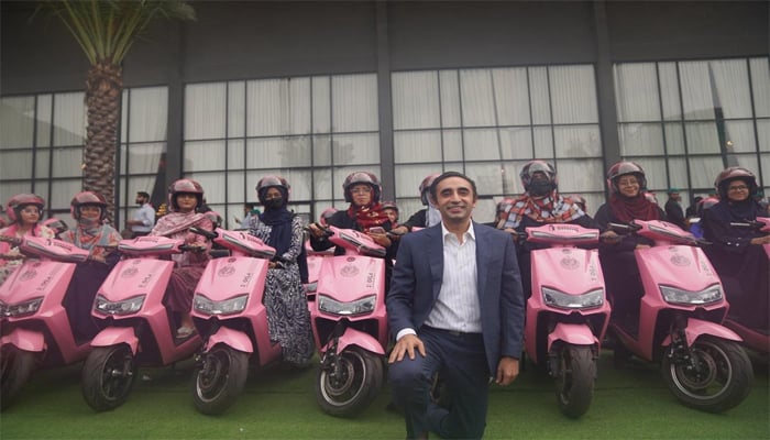 Women on pink scooties given by Pakistan Peoples Party (PPP) Chairman Bilawal Bhutto Zardari at the Pink Scooty Scheme event held on September 25, 2025, at the Royal Taj Banquet. — Instagram/@ppp.official