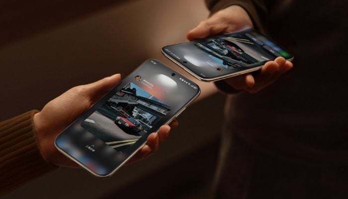 An undated image of two persons holding a Huawei Mate 70 Air. — Huawei