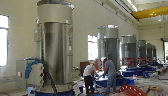 Karachi Water and Sewerage Corporation (KW&SC) Dhabeji pumping stations employees are seen in this image. — Facebook/@CMSindh.Page/File