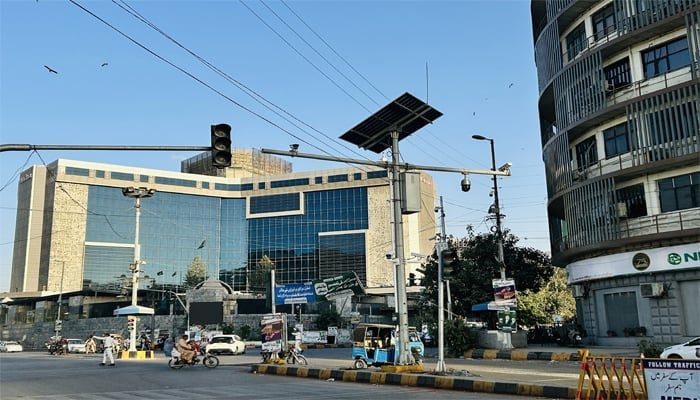 An image shows faceless e-challan cameras set up at PIDC, Karachi, taken on November 9, 2025. — Gadinsider