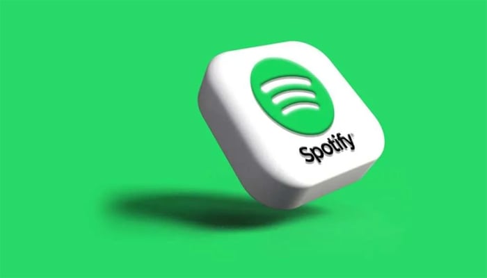 An illustration shows Spotify logo. — iStock