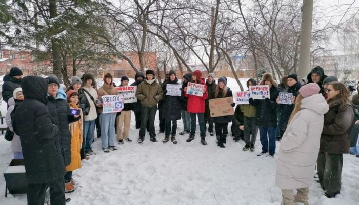 An image of people taking part in a protest against Russias ban on US childrens gaming platform Roblox in the Siberian city of Tomsk, Russia, December 14, 2025. — Reuters