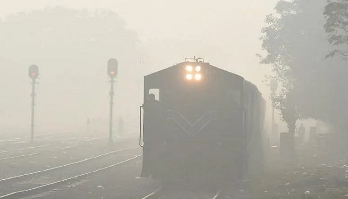 An undated image of train on a track in foggy weather. AFP