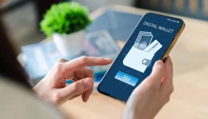 An undated image of a person using a digital wallet. — iStock