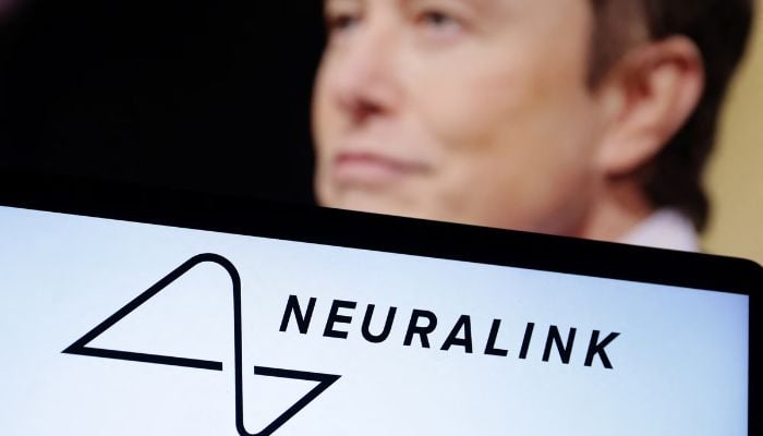 An image of the Neuralink logo and Elon Musk photo is seen in this illustration taken on December 19, 2022. — Reuters