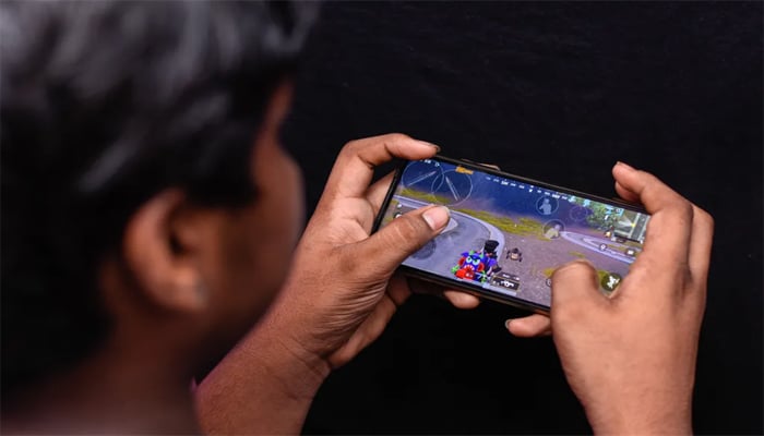 An undated image of a person playing PUBG on a smartphone. — Getty Images
