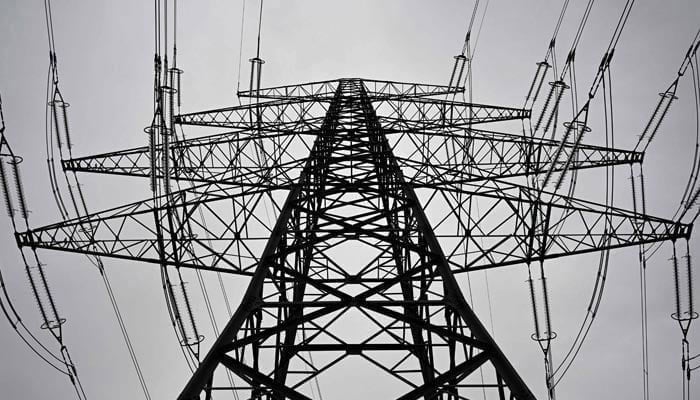 A representational image of a transmission tower, also known as an electricity pylon. — AFP