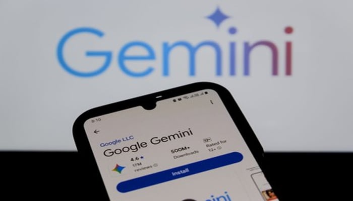 An undated image shows Google Gemini app in App Store on smartphone, along with Gemini logo on background. — Shutterstock