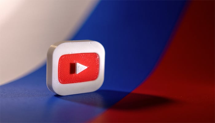Youtube logo is placed on a Russian flag in this illustration picture taken February 26, 2022. — Reuters