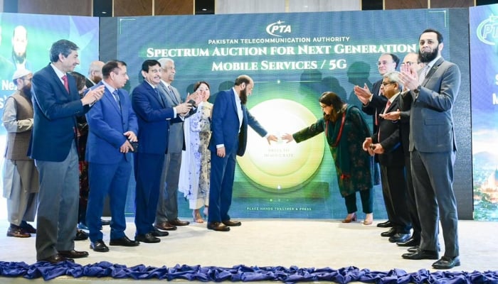An image shows Pakistans 5G spectrum auction ceremony, dated March 10, 2026. — X/@MoitOfficial