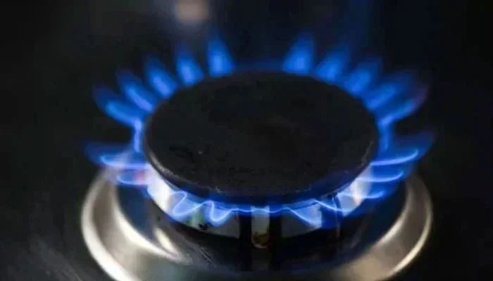 The representational image shows the flames of a lit burner of a gas stove. — AFP/File