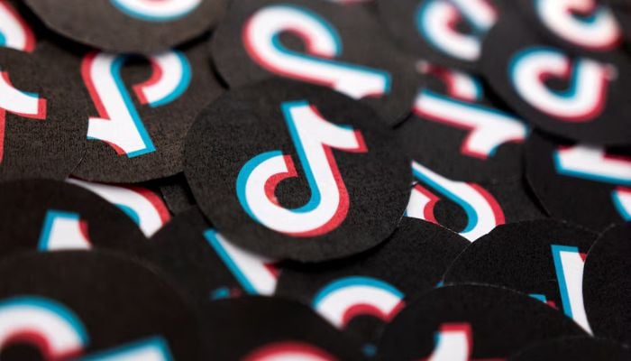 Printed TikTok logos are seen in this illustration taken February 15, 2022. — Reuters