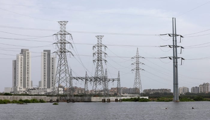 Power transmission towers are pictured in Karachi, Pakistan July 26, 2022. — Reuters