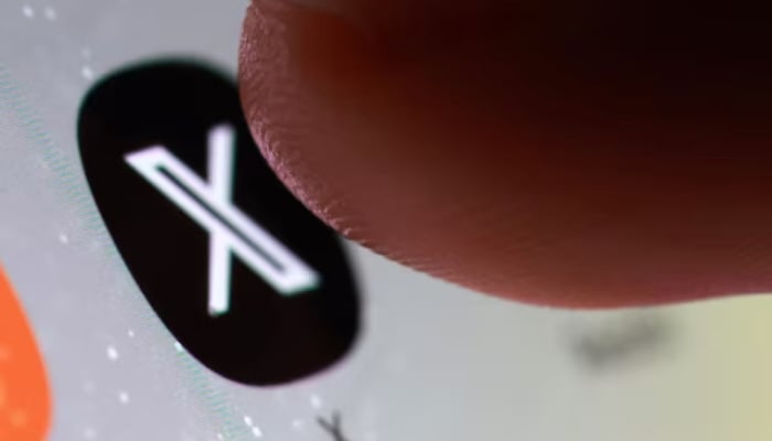 X app icon on a smartphone in this illustration taken October 27, 2025. — Reuters