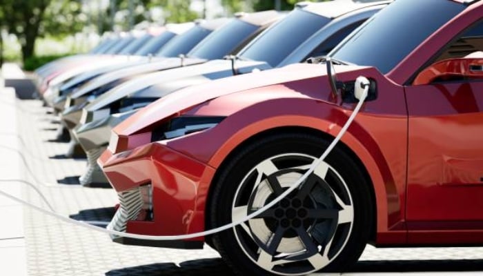 An undated image shows a Tesla EV being charged. — iStock